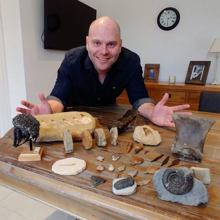 Peter A. Johnson with his fossil collection